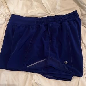 Lululemon hotty hot shorts in a size 10 tall(4 Inches) in the color blue.